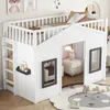 A child's loft bed designed to look like a house, with a ladder and windows. The bed is furnished with pillows and blankets, and the area around it is decorated with children's artwork and a rug. Produktbild-Vorschau