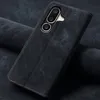 A dark denim-textured phone case is shown on a dark, textured background. Produktbild-Vorschau