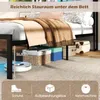 Underneath a bed frame, showing storage space and a robot vacuum cleaner. Náhled obrázku produktu