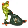 A figurine of a green frog holding a money bag with a euro symbol on it. Produktbild-Vorschau