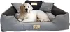A golden retriever puppy lies in a large, dark gray and light gray dog bed with pillows. Voir les images du produit