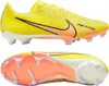 A pair of yellow soccer cleats shown from two angles: side view and bottom view. Produktbild-Vorschau