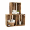 Three wooden crates are stacked and arranged, with decorative items inside. Produktbild-Vorschau