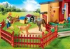 A Playmobil playset depicting a dog hotel with figures and dogs in an outdoor setting. Produktbild-Vorschau