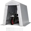 A motorcycle is parked inside a gray portable garage tent. Produktbild-Vorschau