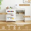 A white sewing table with various sewing supplies organized on its shelves and surface. Anteprima dell’immagine prodotto