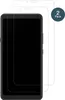Two screen protectors are shown on top of a black smartphone. Podgląd zdjęcia produktu