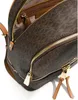 Close-up view of a brown Michael Kors backpack with gold zippers. Anteprima dell’immagine prodotto