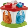 A colorful toy house with shape sorter blocks on top and animal shapes on the sides. Produktbild-Vorschau