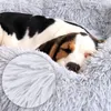 A close-up view of a beagle puppy sleeping on a soft, fluffy gray dog bed. A circular inset shows a magnified view of the bed's plush texture. Náhľad obrázku produktu