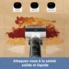 A wet and dry vacuum cleaner is shown cleaning up a spill on a wooden floor, with different cleaning modes displayed. Produktbild-Vorschau