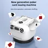 A white automatic poker card issuing machine with poker cards flying around it. Podgląd zdjęcia produktu
