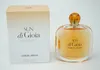 A product shot of a perfume bottle and its box against a white background. Produktbild-Vorschau