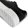 A close-up view of the heel and sole of a black Puma Carina 2.0 sneaker. Podgląd zdjęcia produktu