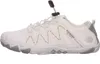 A single white and gray shoe is shown from the side against a white background. Podgląd zdjęcia produktu