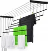 A ceiling-mounted clothes drying rack with clothes and towels hanging on it. Produktbild-Vorschau