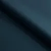A close-up view of dark blue fabric, likely a sofa or upholstery, with a fold creating a shadow. Produktbild-Vorschau