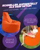 A young person is sitting on an orange beanbag chair outdoors, playing a video game. Another orange beanbag chair is shown indoors. Produktbild-Vorschau