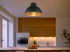 A modern kitchen with a pendant light fixture. Anteprima dell’immagine prodotto