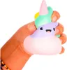 A hand is squeezing a squishy toy shaped like a unicorn. Voir les images du produit