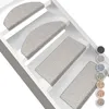 Stair mats are placed on stairs in a white staircase. Produktbild-Vorschau
