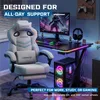 A gaming chair and desk setup with a computer and accessories, illuminated by RGB lighting. Produktbild-Vorschau