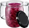 Three glass jars, one filled with purple cabbage and two empty, with a black lid in the foreground. Anteprima dell’immagine prodotto