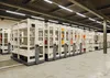 A row of industrial shelving units in a warehouse. Produktbild-Vorschau