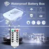 A diagram showing a waterproof battery box and a remote control for LED string lights. Produktbild-Vorschau