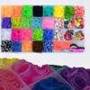 A top-down view of a large plastic organizer box filled with colorful loom bands, beads, and crafting tools. Náhled obrázku produktu