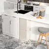 A modern kitchen island with a sink, faucet, and cabinets. Anteprima dell’immagine prodotto