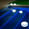 Floating lights in a swimming pool at night. Produktbild-Vorschau