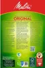 The back of a Melitta coffee filter packaging with multilingual text and certifications. Voir les images du produit