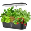 An indoor smart hydroponic garden system with various herbs and strawberries growing under an LED grow light. Produktbild-Vorschau
