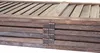 A close-up view of the hinges and wooden slats of a folded screen. Podgląd zdjęcia produktu