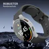 A smartwatch with a protective case is shown against a dark, rocky background with shards of material flying around it. Produktbild-Vorschau