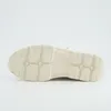 The sole of a beige shoe is shown against a white background. Produktbild-Vorschau