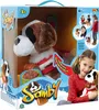A toy dog named Samby in its retail packaging, with a child holding a smaller version of the toy. Produktbild-Vorschau