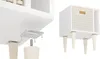Close-up view of furniture legs being attached to a white cabinet. Podgląd zdjęcia produktu
