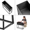 A collage of four images showing a black metal planter on a stand from different angles, including a close-up of the stand's legs and a person interacting with the planter. Produktbild-Vorschau