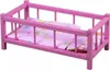 A pink doll bed with purple bedding. Náhled obrázku produktu