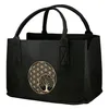 A black felt tote bag with a golden tree of life and flower of life motif. Produktbild-Vorschau