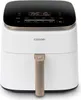 A white COSORI air fryer with a black top control panel and gold handle, displayed against a white background. Náhľad obrázku produktu