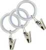 Three curtain rings with clips attached, arranged in a cluster. Podgląd zdjęcia produktu