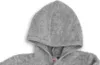 A close-up view of the hood and upper chest area of a gray baby overall. Produktbild-Vorschau