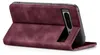 A burgundy flip case for a Google Pixel 8 Pro phone, shown from the side with the phone partially inserted. Produktbild-Vorschau