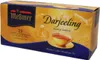 A box of Meßmer Darjeeling tea with an image of mountains and a cup of tea. Náhled obrázku produktu