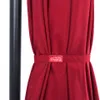 A close-up of a red umbrella tied with a red band that has a logo on it. Voir les images du produit