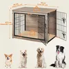 A dog crate with dimensions and weight limits shown, and four dogs of different breeds at the bottom. Produktbild-Vorschau