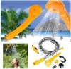 Collage of a portable camping shower in use and as a product shot, set against a beach and tropical background. Náhled obrázku produktu